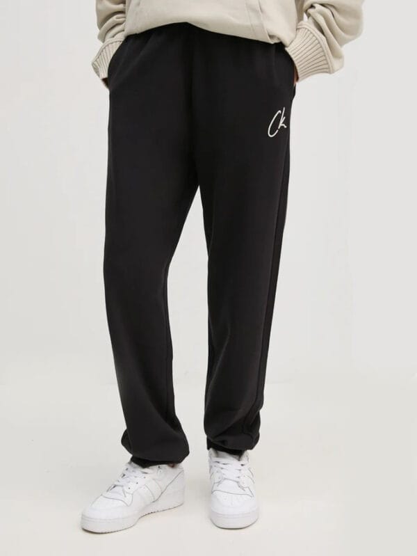 Calvin Klein dámské černé tepláky J20J224441 L