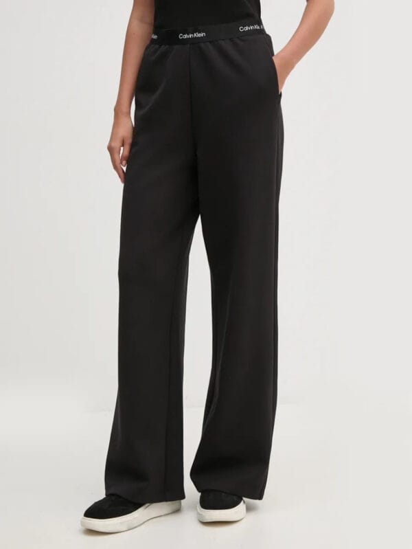 Calvin Klein dámské černé tepláky J20J224684 M