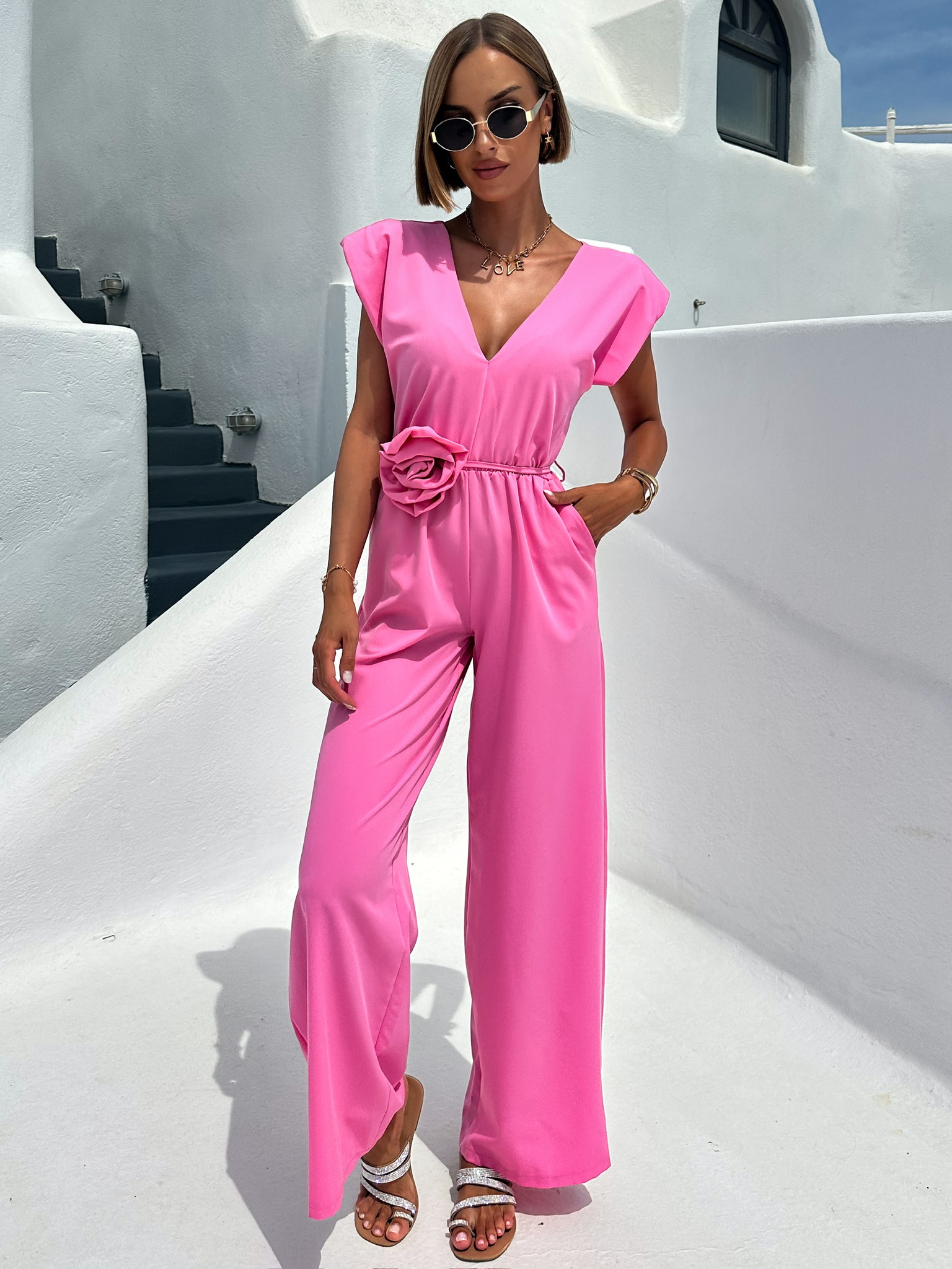 Růžový dlouhý elegantní overal KOSMAS s výstřihem Velikost: ONESIZE